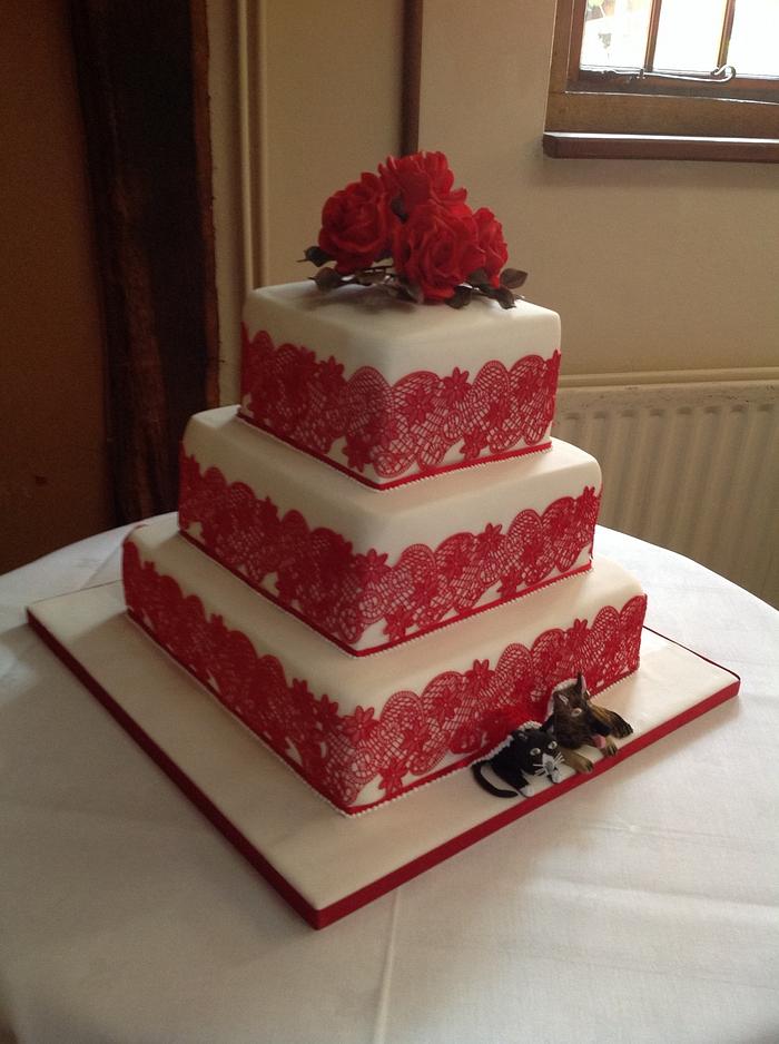 Red and white lace wedding cake
