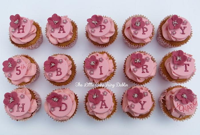 Pink birthday cupcakes