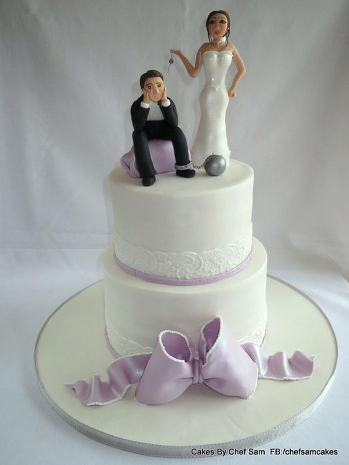 Lilac wedding cake with novelty sugar paste couple