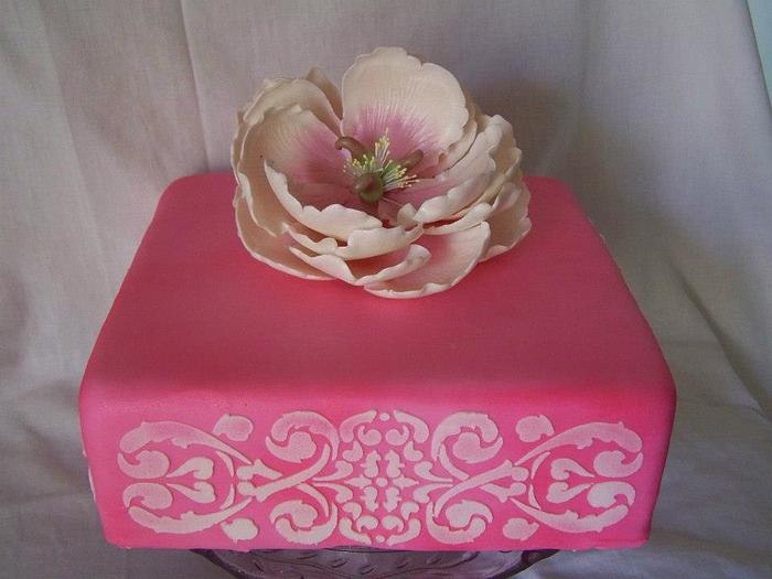 Pink cake with peony