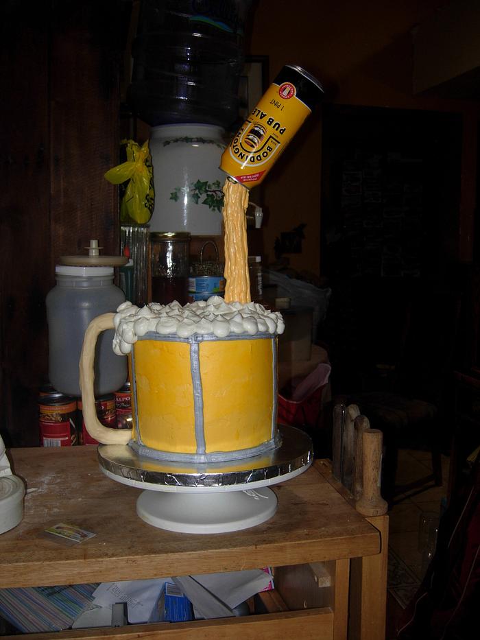 Beer Stein cake with pouring can