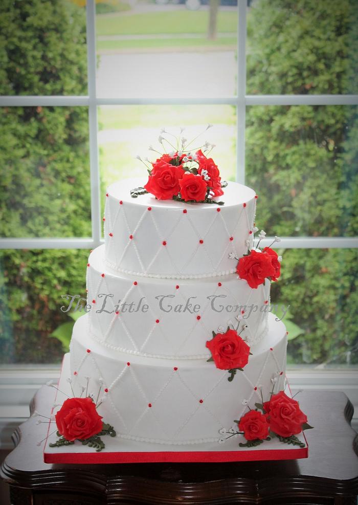 white and red wedding cake