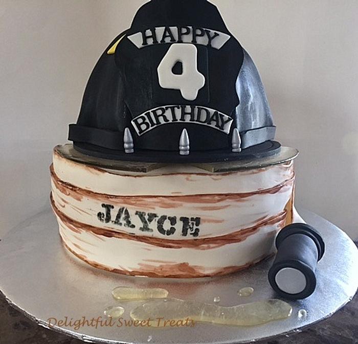 Firemans helmet and hose cake