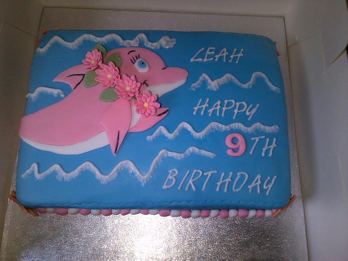 pink and white dolphin cake