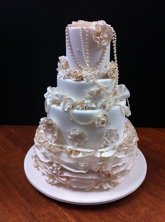 Ruffles and pearls wedding cake
