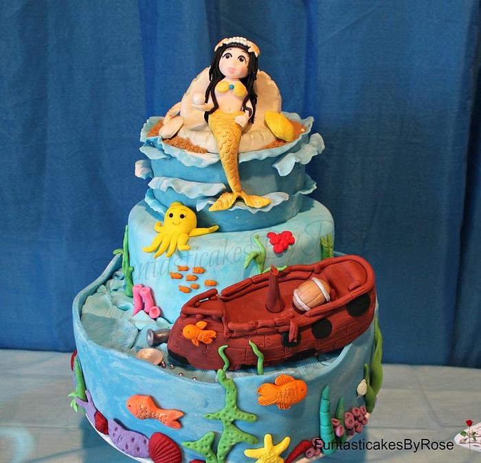 Under the sea mermaid and sunken pirate ship  cake