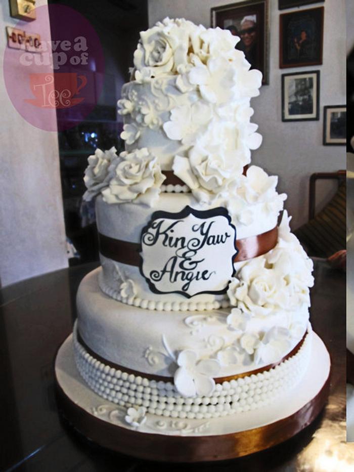 A simple white wedding cake