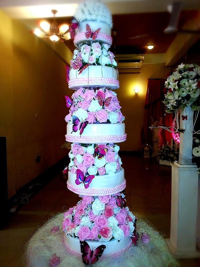 Butterflies and roses wedding cake