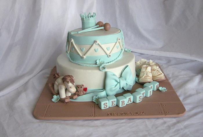 Vintage drum cake with shoes and rocing horse