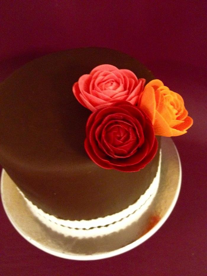 Chocolate cake with ranunculus