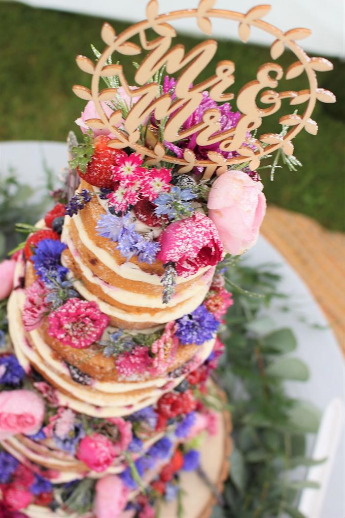 Naked cake and edible flowers.