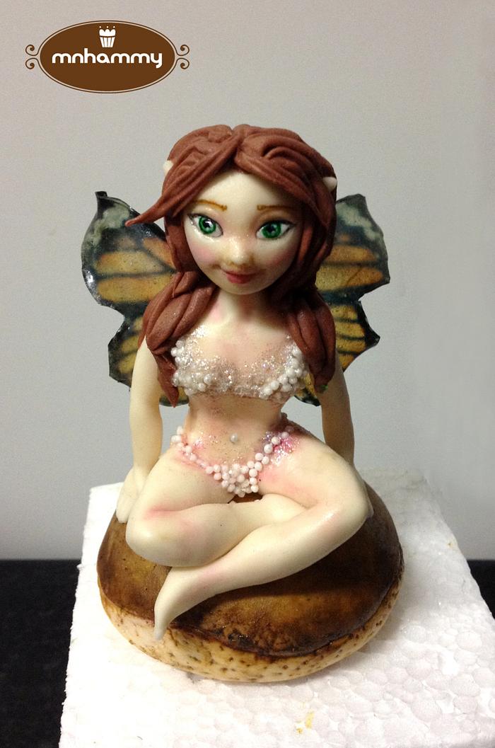 Fairy with gelatin printed butterfly wings 