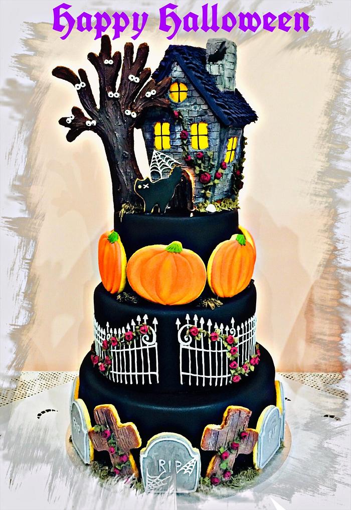 Haunted cookie house cake🎃👻💜