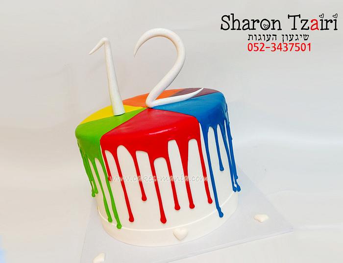 dripping cake rainbow colors