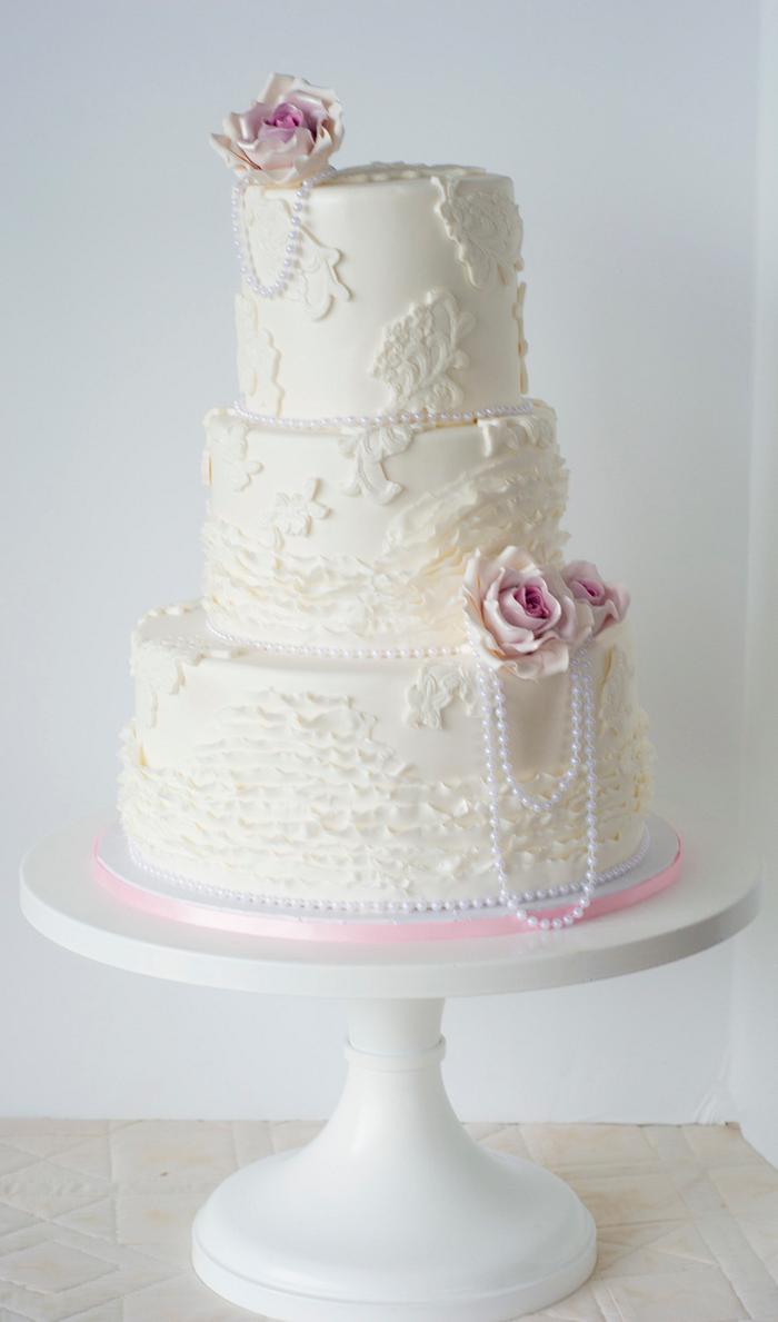 Vintage lace wedding cake with Blush Sugar roses 