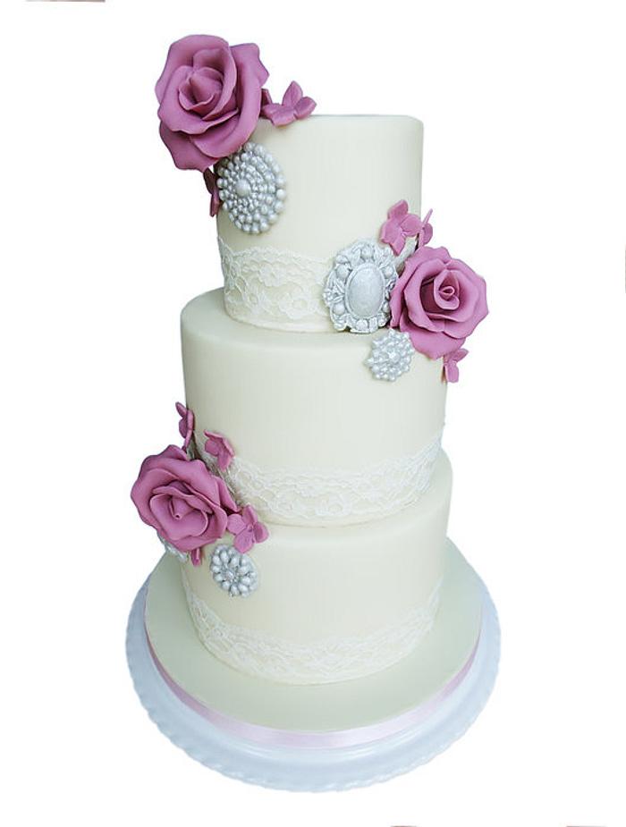Roses and brooches wedding cake