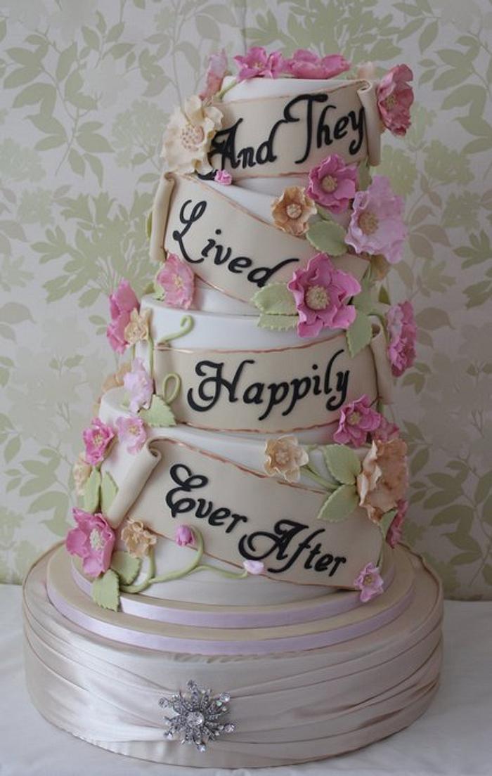 Topsy turvy "And They Lived Happily ever After" wedding cake