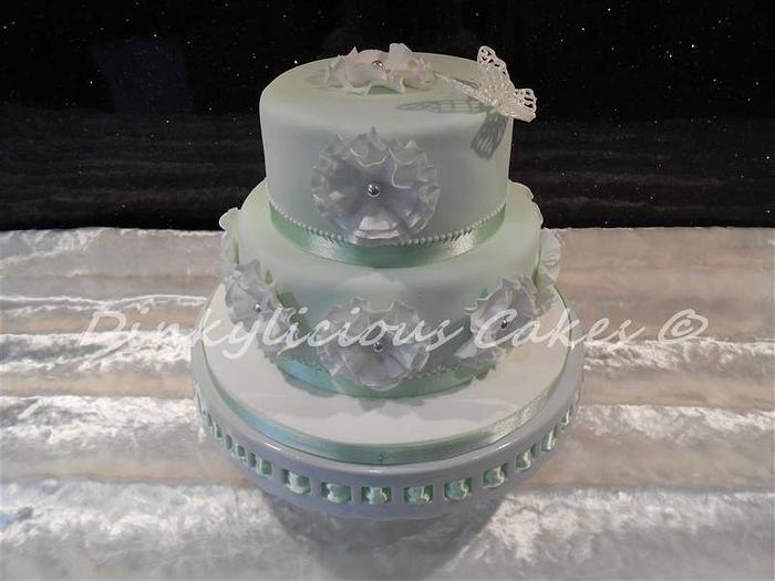 vintage green 2 tier cake with royal icing butterfly
