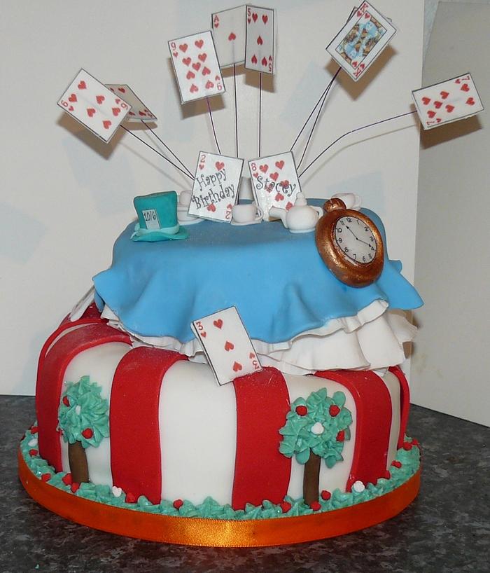 Alice in Wonderland cake with flying cards 