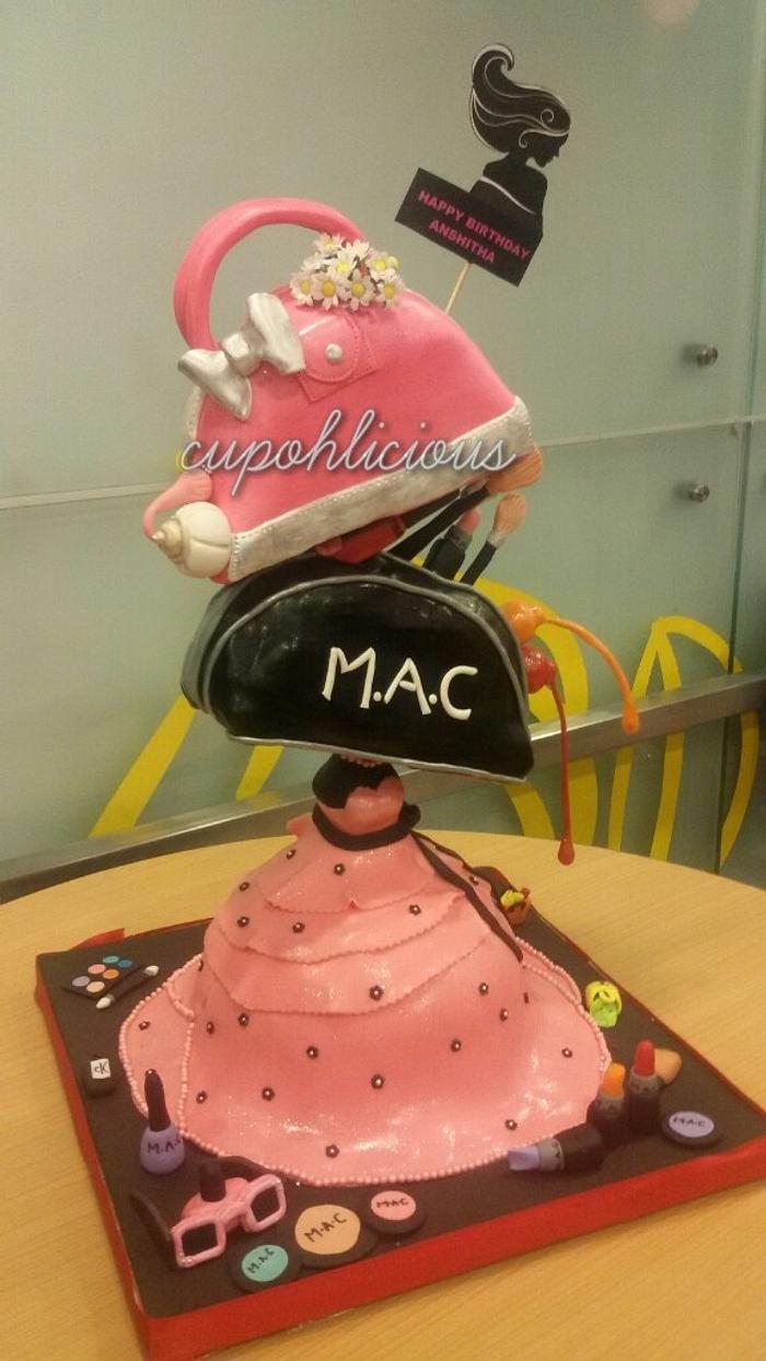 A whimsical fashion themed cake.