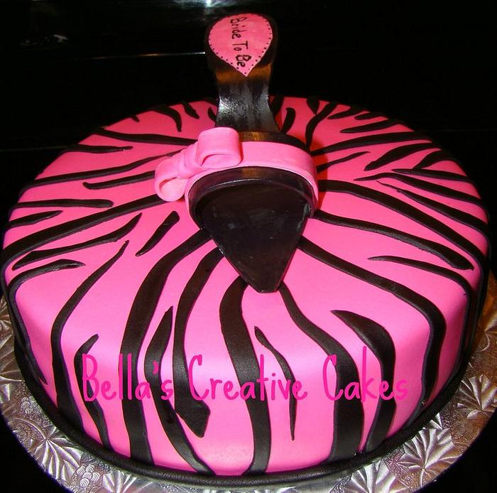 Zebra cake and pink shoe
