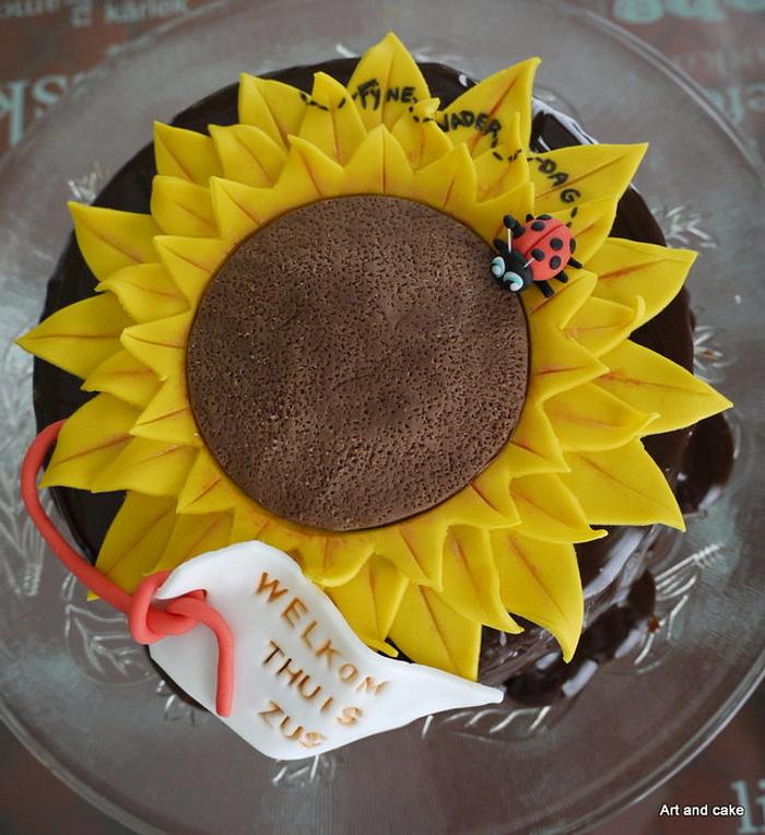 Sunflower cake covered with ganache