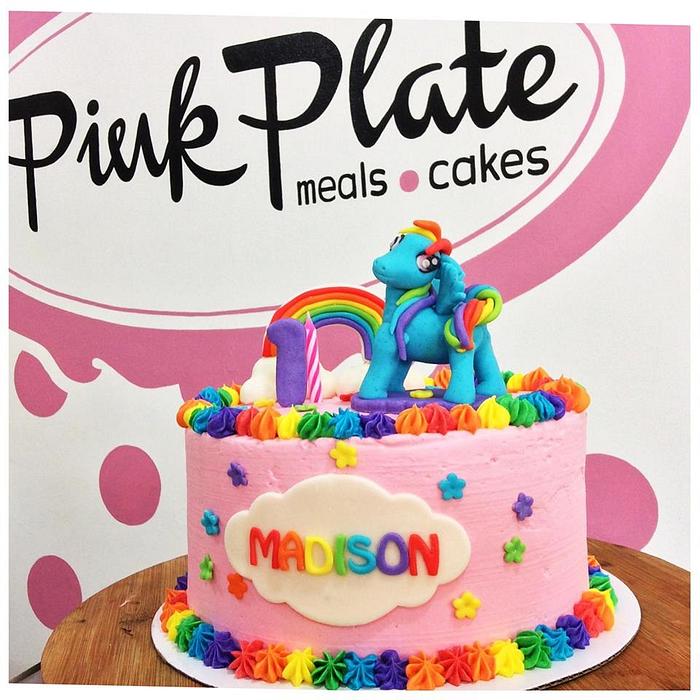 Madison's rainbow-themed cake