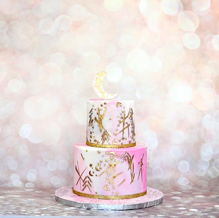 Girly themed moon and star cake