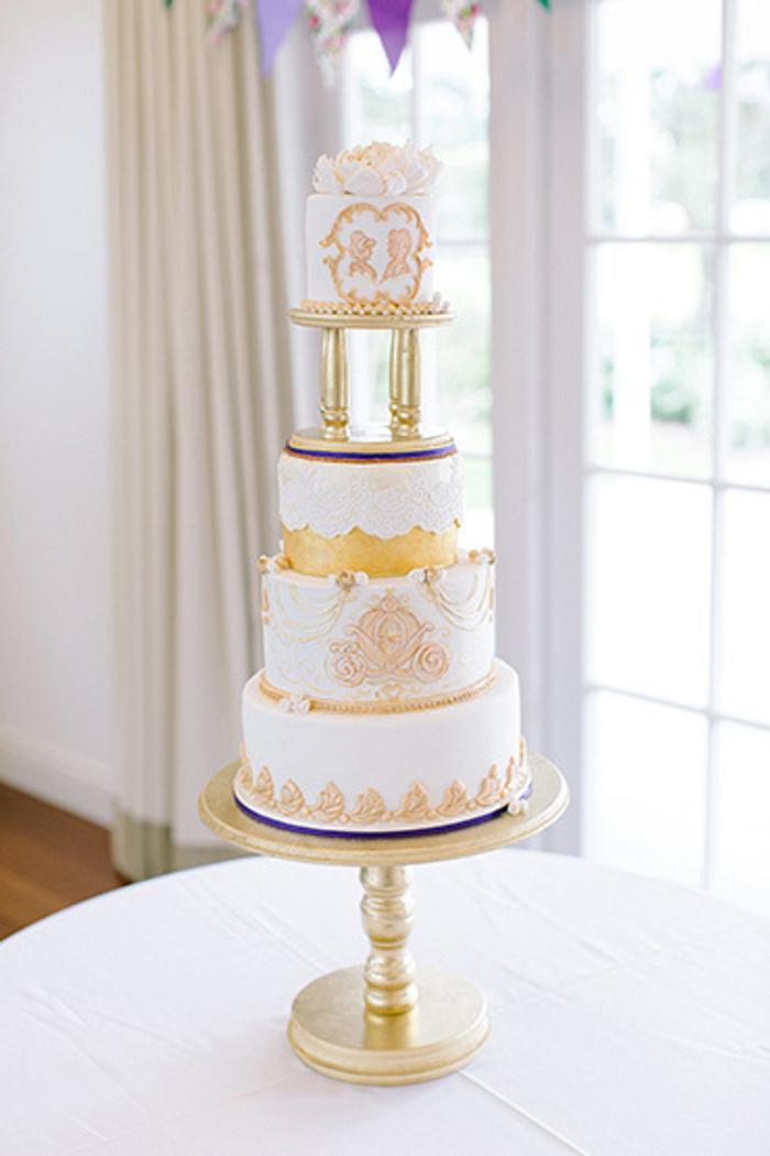 White and gold vintage Disney inspired wedding cake