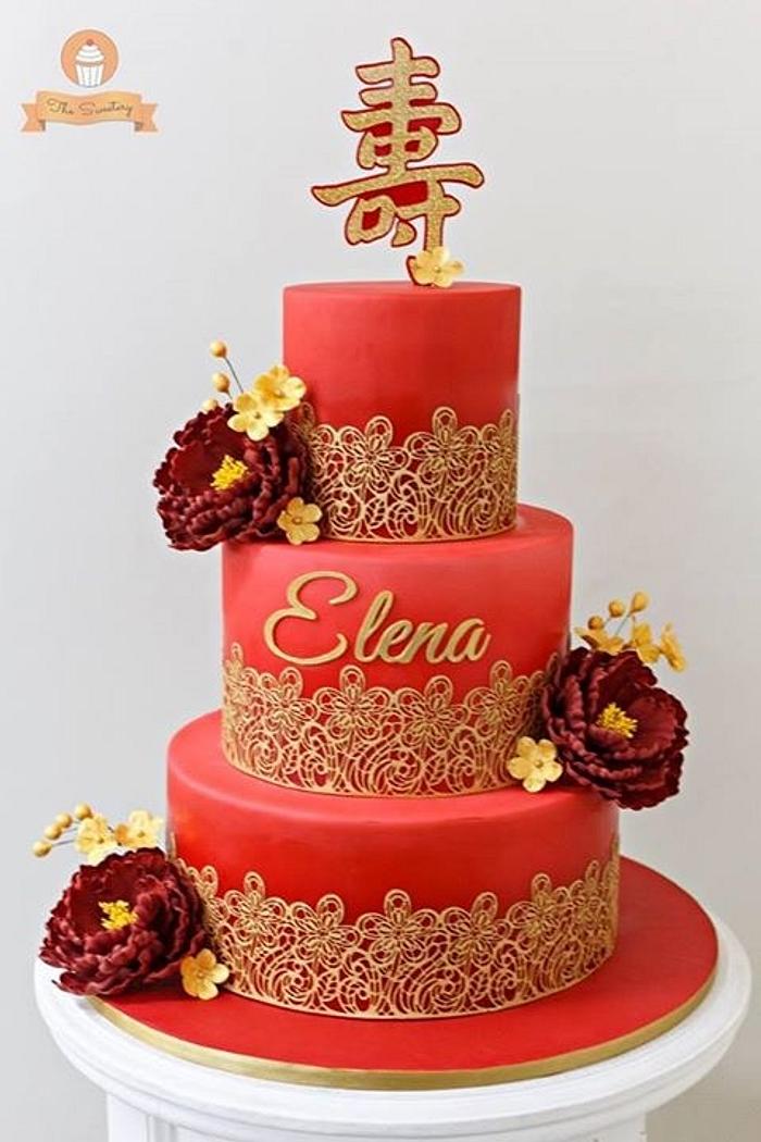 Red and gold longevity cake