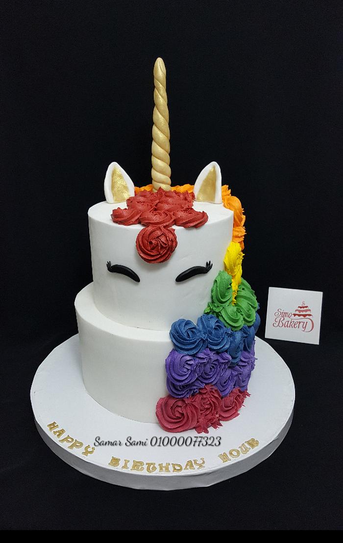 Unicorn rainbow cake and cupcakes