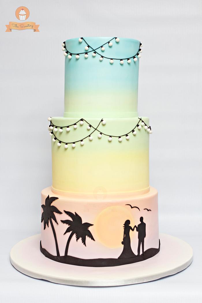 Pastel rainbow silhouette wedding cake