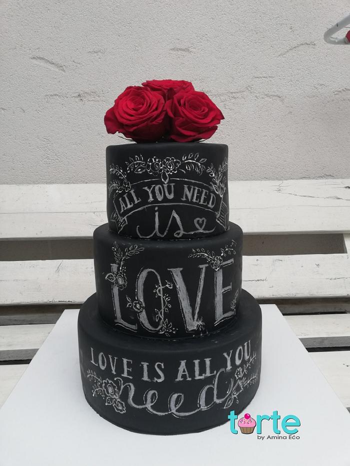 Black wedding cake with chalkboard effect