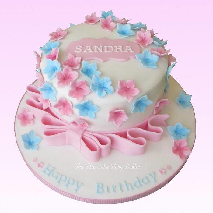 Pink and blue floral cascade birthday cake