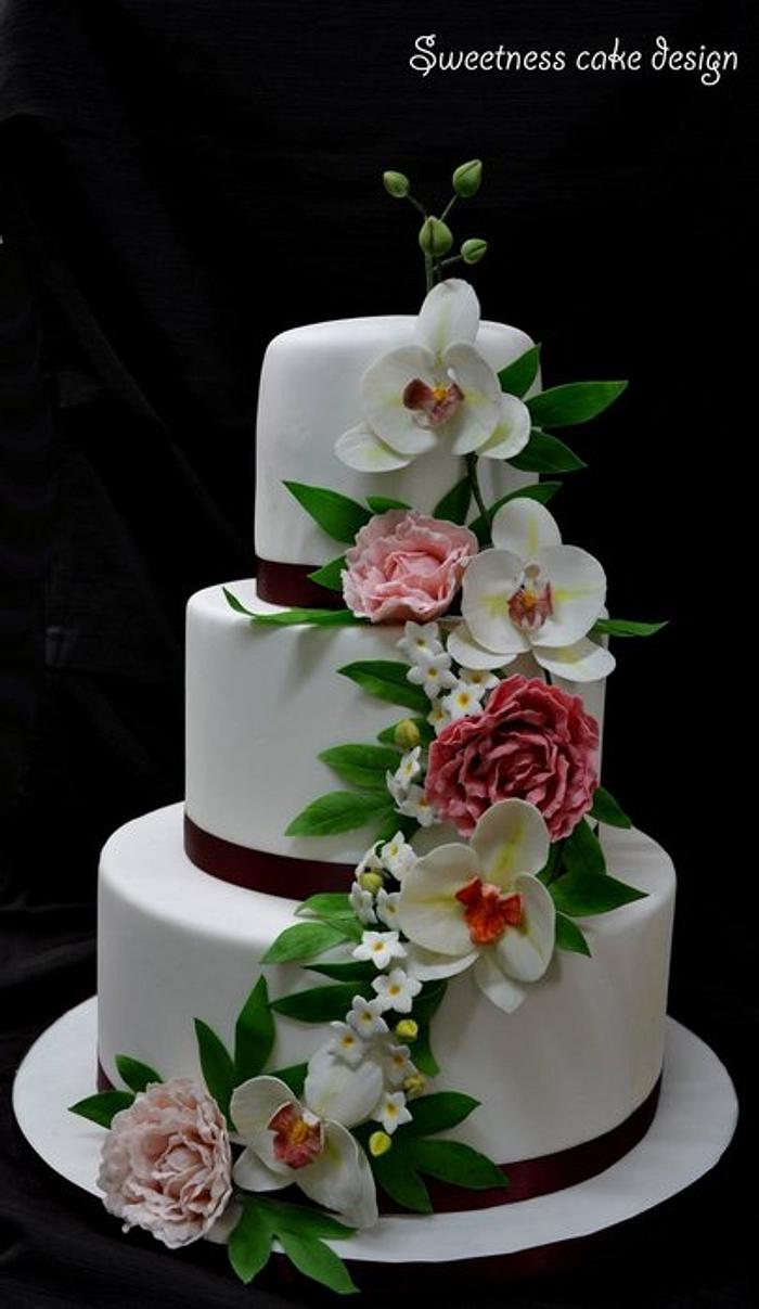 Wedding cake peonies and orchids