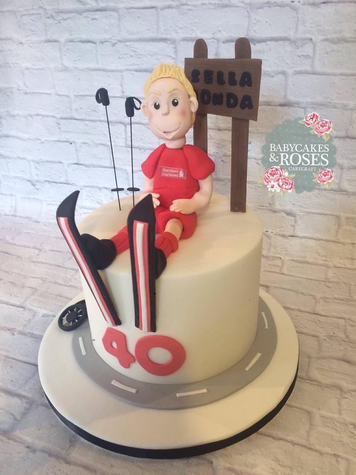 Skiing themed cake with a little football and cycling thrown in 😊