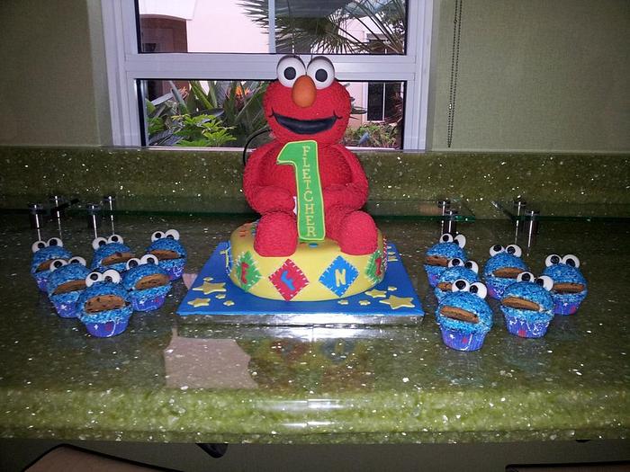 elmo cake with cookie monster cupcakes
