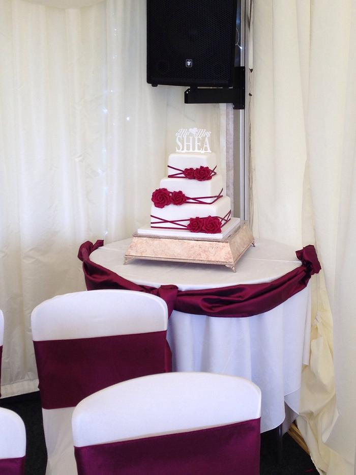 Elegant white and wine colour wedding cake 