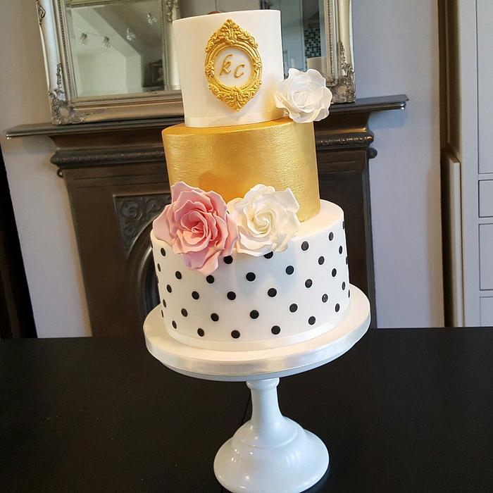 Polka dots and roses wedding cake