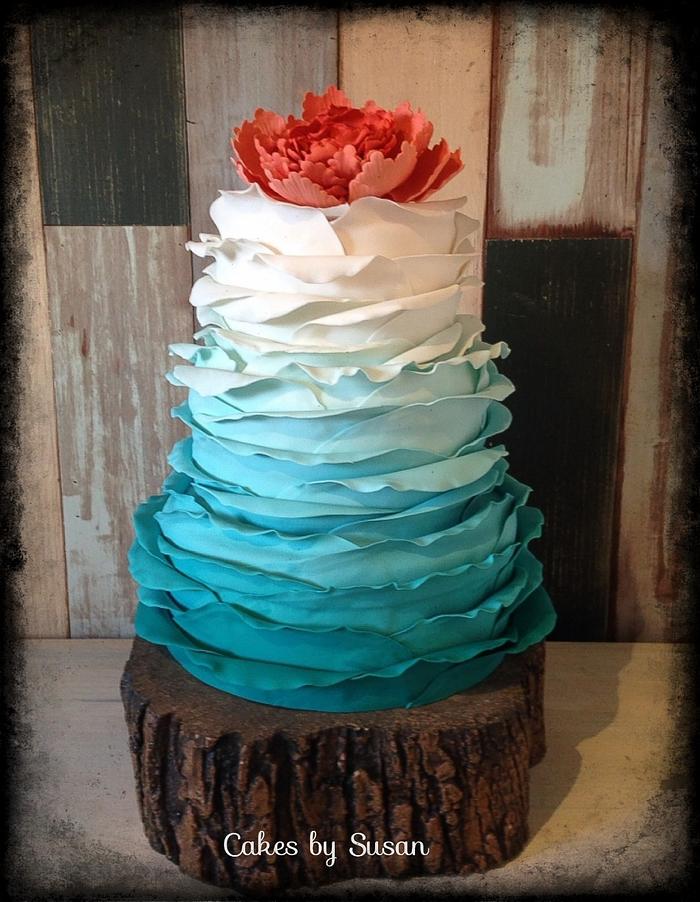Ombré turquoise ruffle wedding cake 