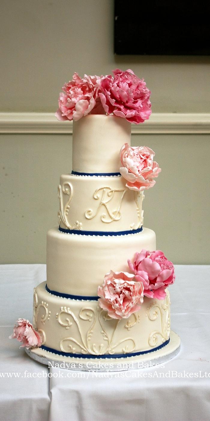 Pink peonies and blue cake