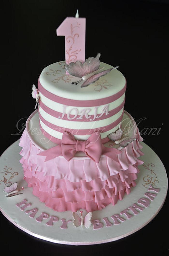 pretty in pink 1st birthday cake