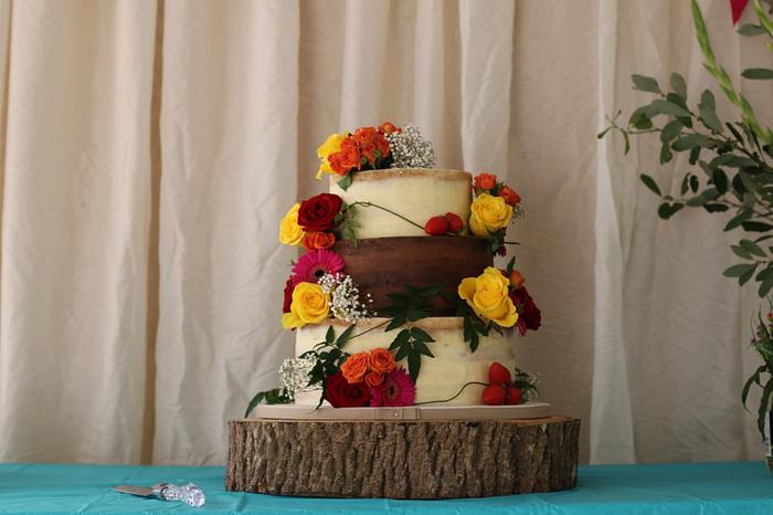 Colourful rustic wedding cake