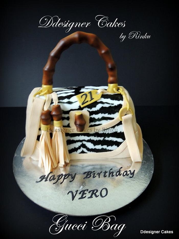 Gucci Handbag Cake - Decorated Cake by D Cake Creations® - CakesDecor
