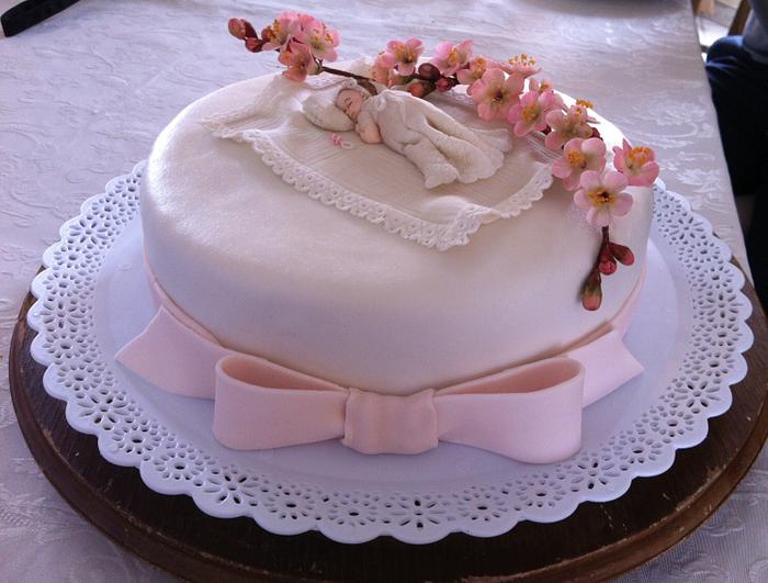 Christening cake with cherry blossoms