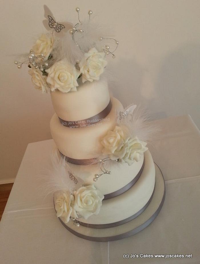 4 Tier Silver and White Roses Wedding Cake