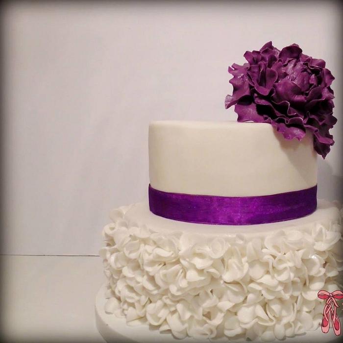 Wedding cake with purple peony