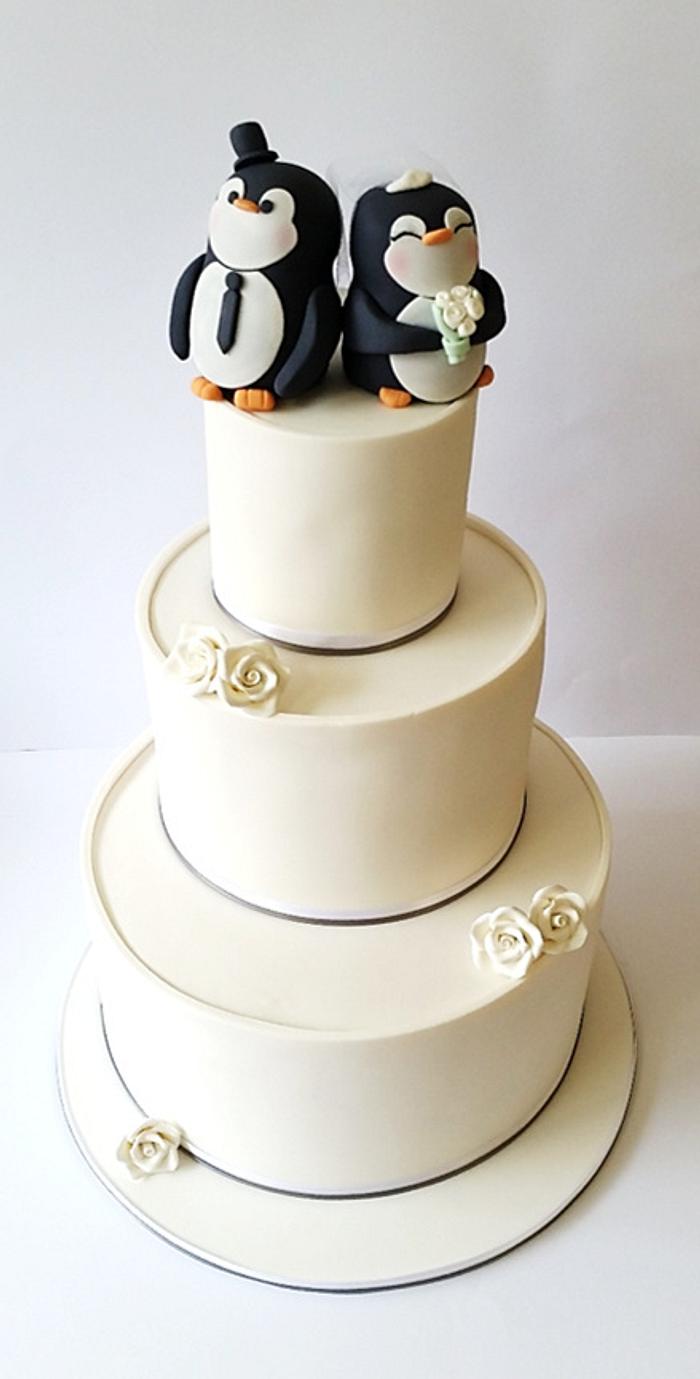 Penguin topper wedding cake