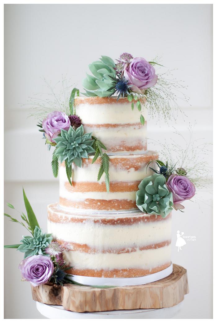 Naked cake with handmade succulents and roses