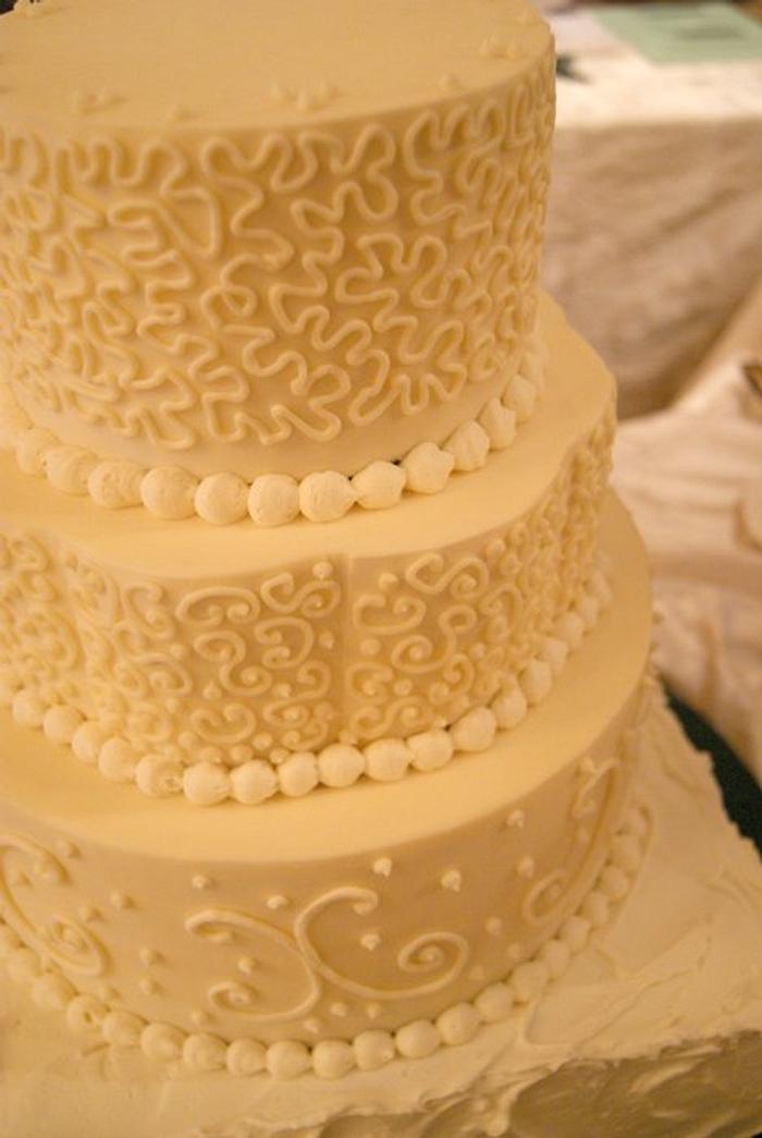 Multi-shape, multi-swirl wedding cake